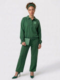 Two piece pants and top with emblem on both